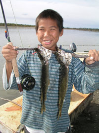 Successfully young angler with pike - Kalskag Science Camp