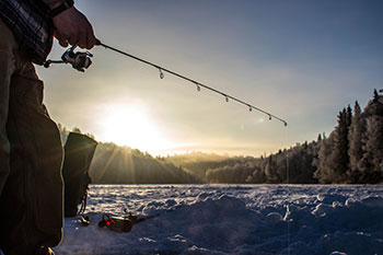 Ice fishing on a sunny day
