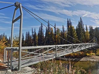 Hunter access bridge in wilderness